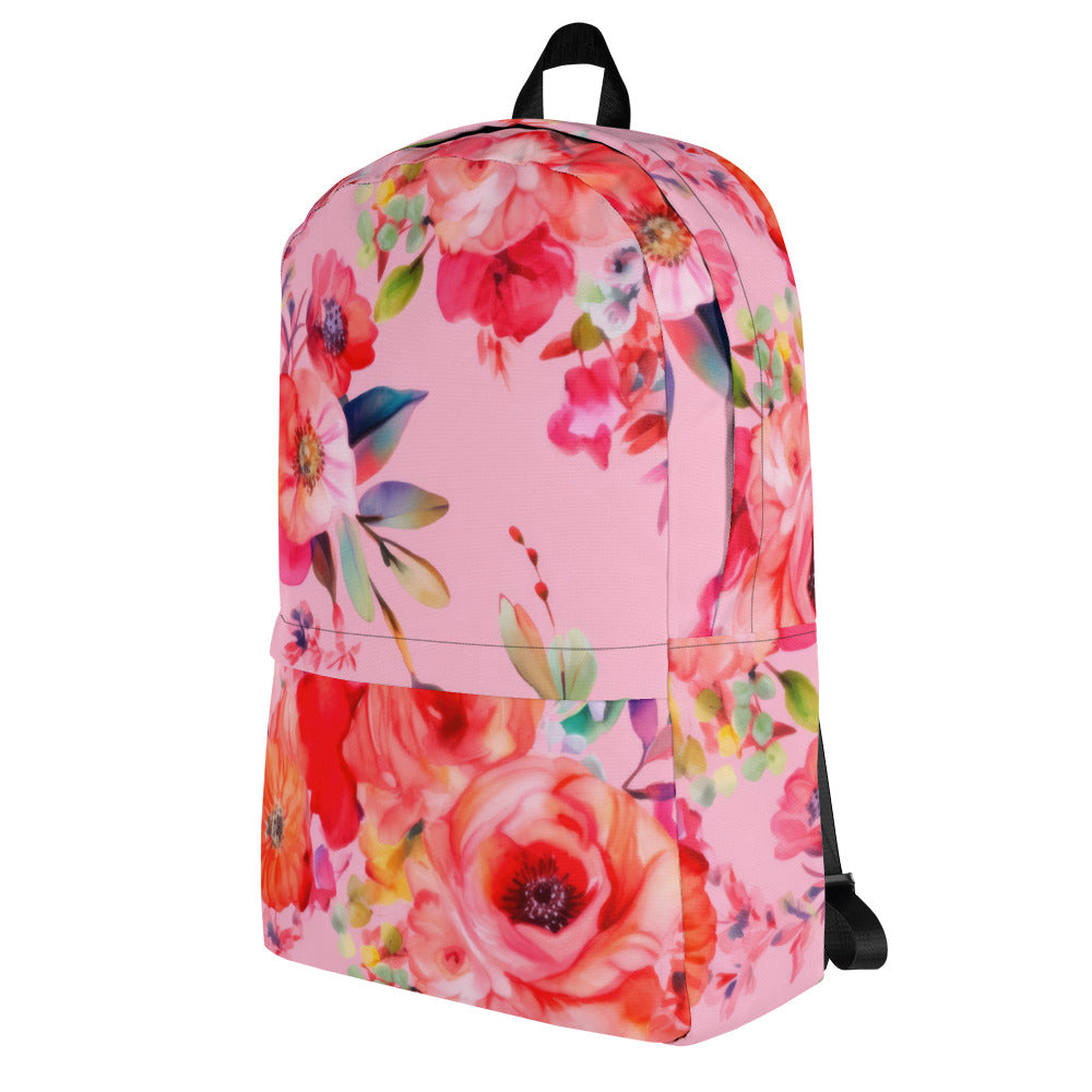 baby pink backpack with multicolor and red botanical floral feminine pattern and black straps and handle with exterior zipper pocket and zipper main enclosure angled view