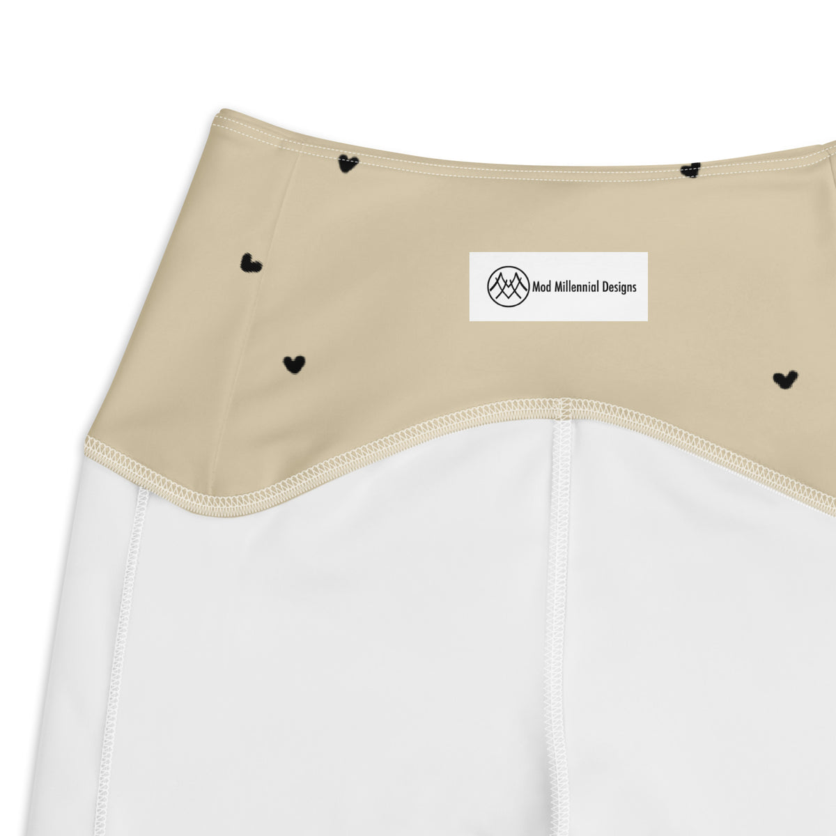 Beatrix cream beige crossover leggings with pockets and tiny black heart print inner band details