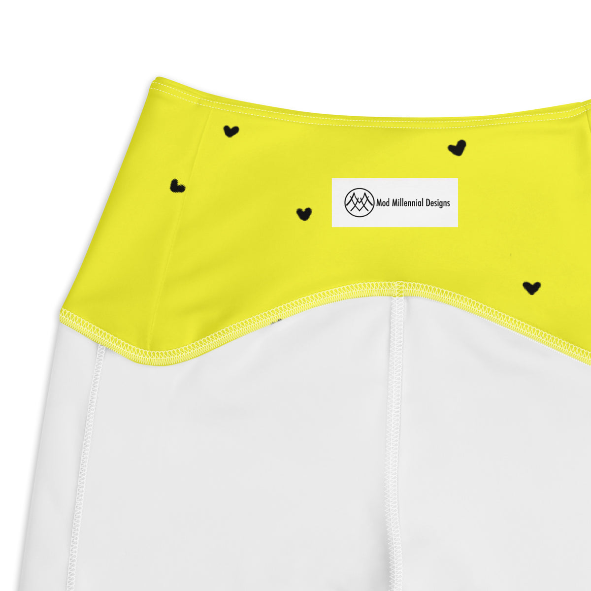 Virginia neon yellow crossover leggings with pockets and tiny black heart print inner band details