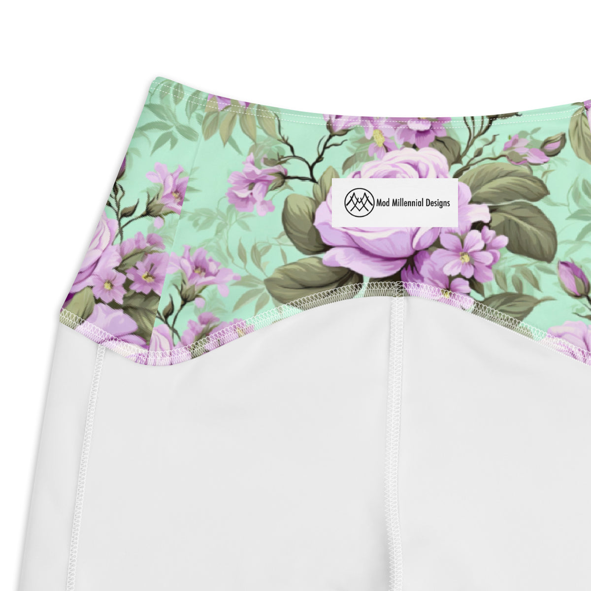 mint green crossover leggings with side pockets with purple roses and green florals botanical feminine pattern showing the inner band details