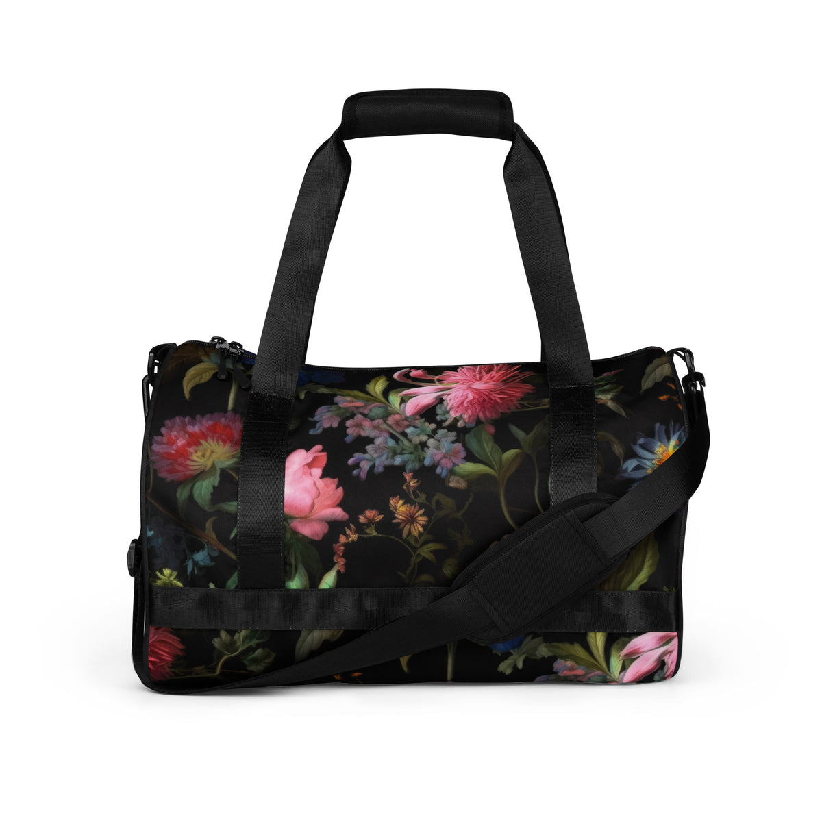 Gym duffle bag with zipper and black straps and black removable shoulder strap in black with a colorful red blue and pink floral botanical feminine pattern showing the front