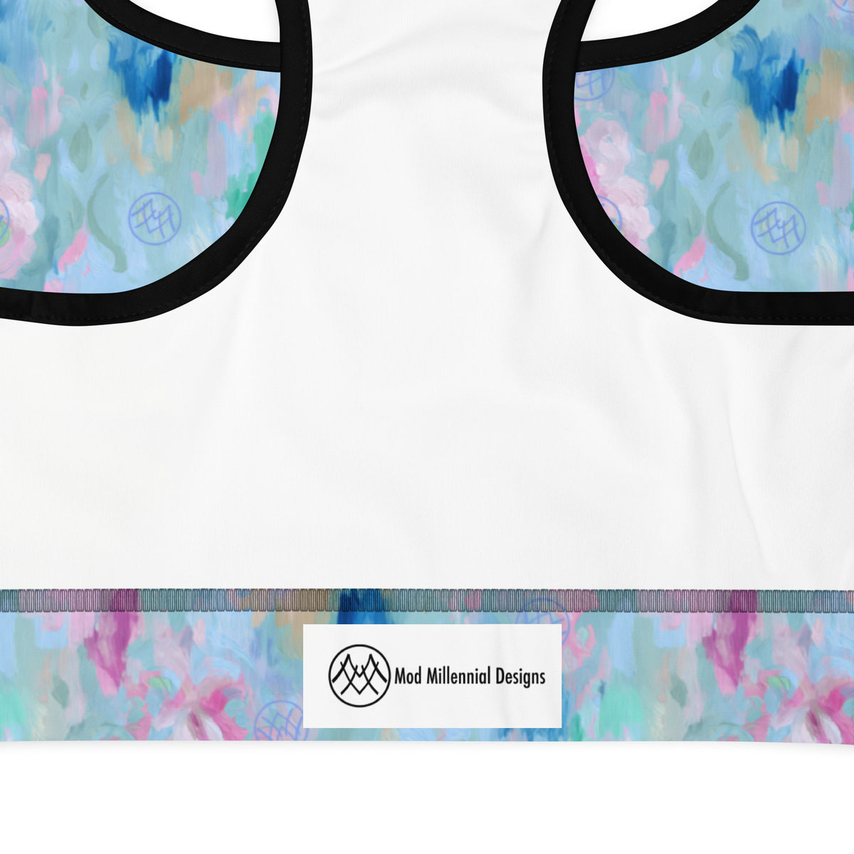 powder blue standard sports bra with black piping with teal navy pink beige and magenta abstract pattern showing the inner band details and the inner lining