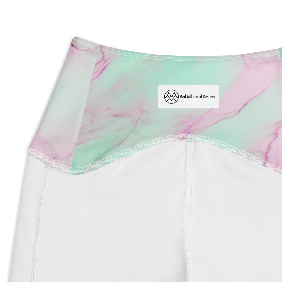 Obrey mint green crossover leggings with pink lavender marble pattern and side pockets inner band details