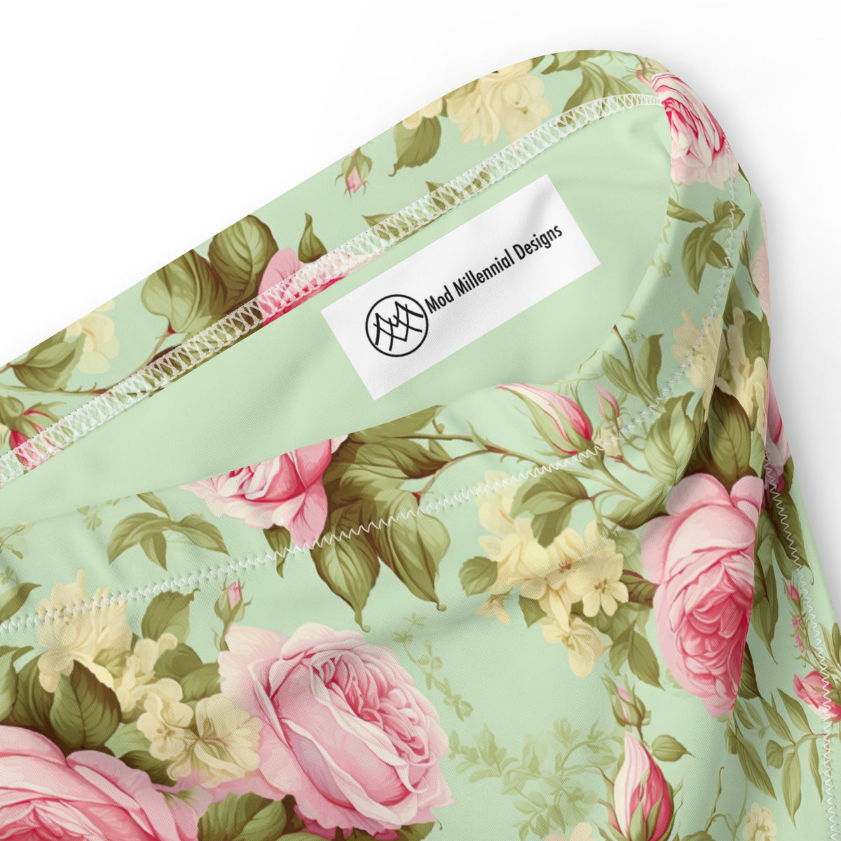 mint green high waist bikini bottoms with pink and yellow roses and green foliage floral feminine botanical pattern showing the inner band details