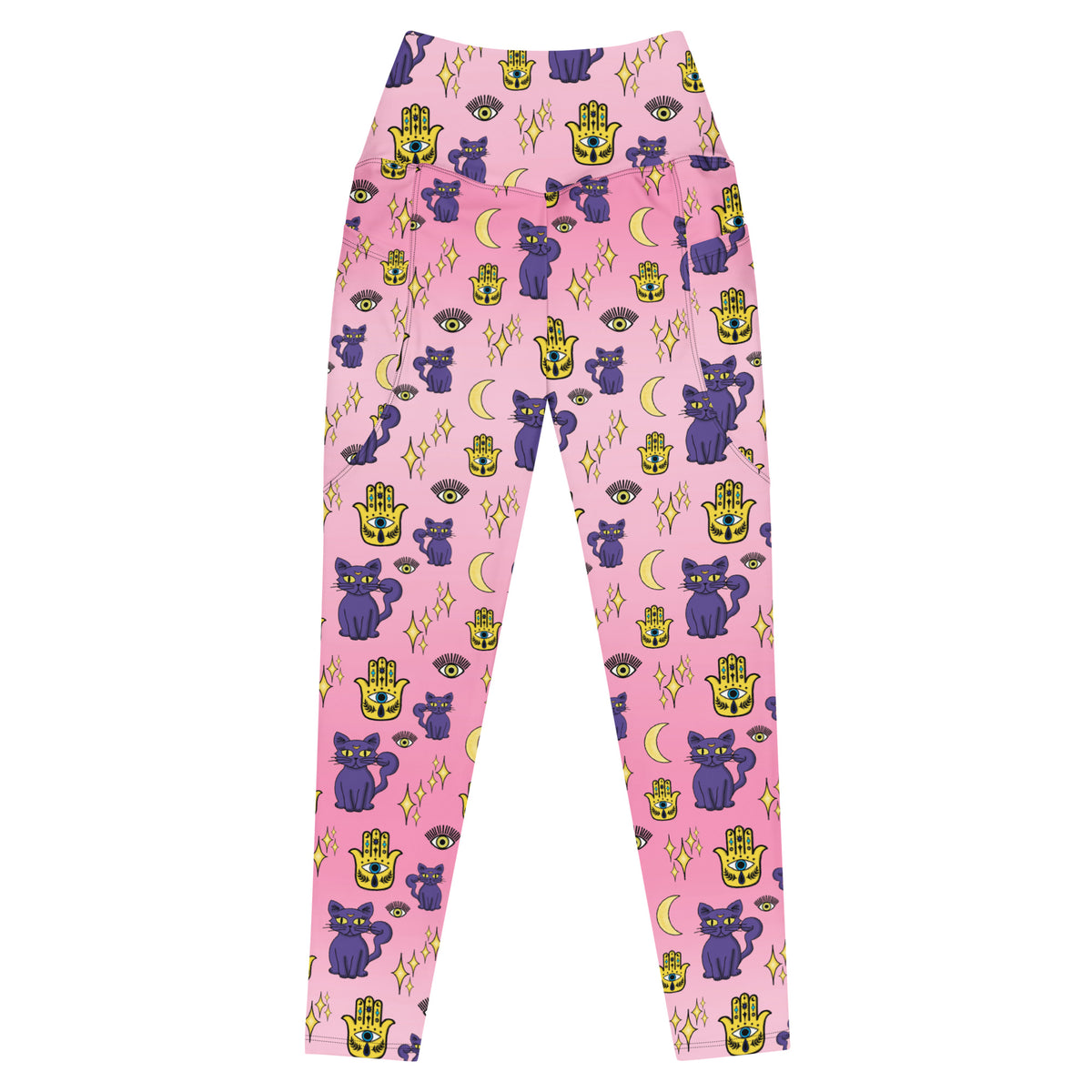 pink leggings with purple cat and evil eye patterns on them with side pockets showing the front