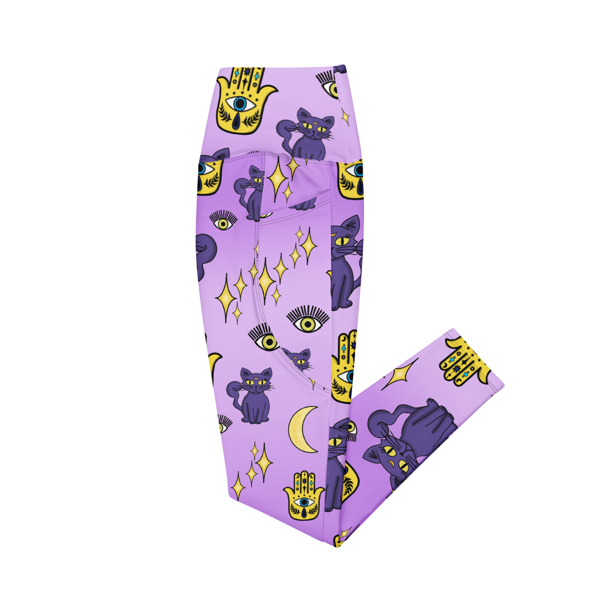 purple leggings with purple cats and yellow evil eye pattern on them with side pockets side view