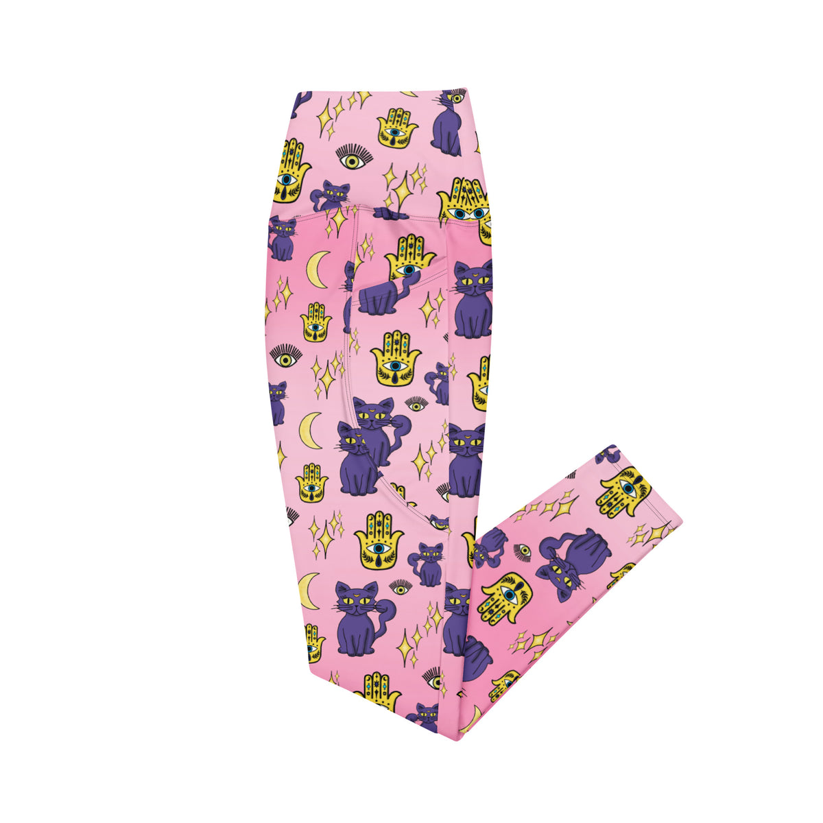 pink leggings with purple cat and evil eye patterns on them with side pockets showing the side view
