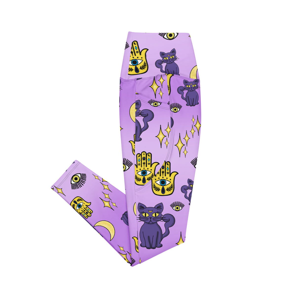 purple leggings with purple cats and yellow evil eye pattern on them with side pockets side view