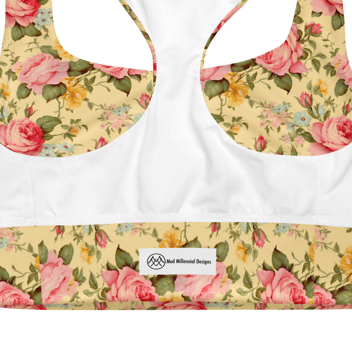 butter yellow longline sports bra with pink yellow and baby blue roses floral feminine botanical pattern showing the inner band details and inner mesh lining