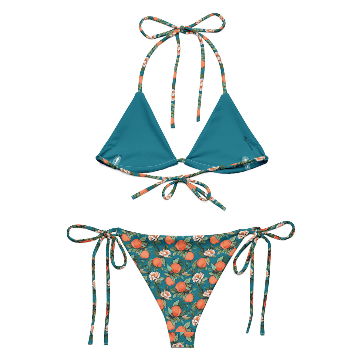 teal bikini with a peach and flower print on it showing the back view