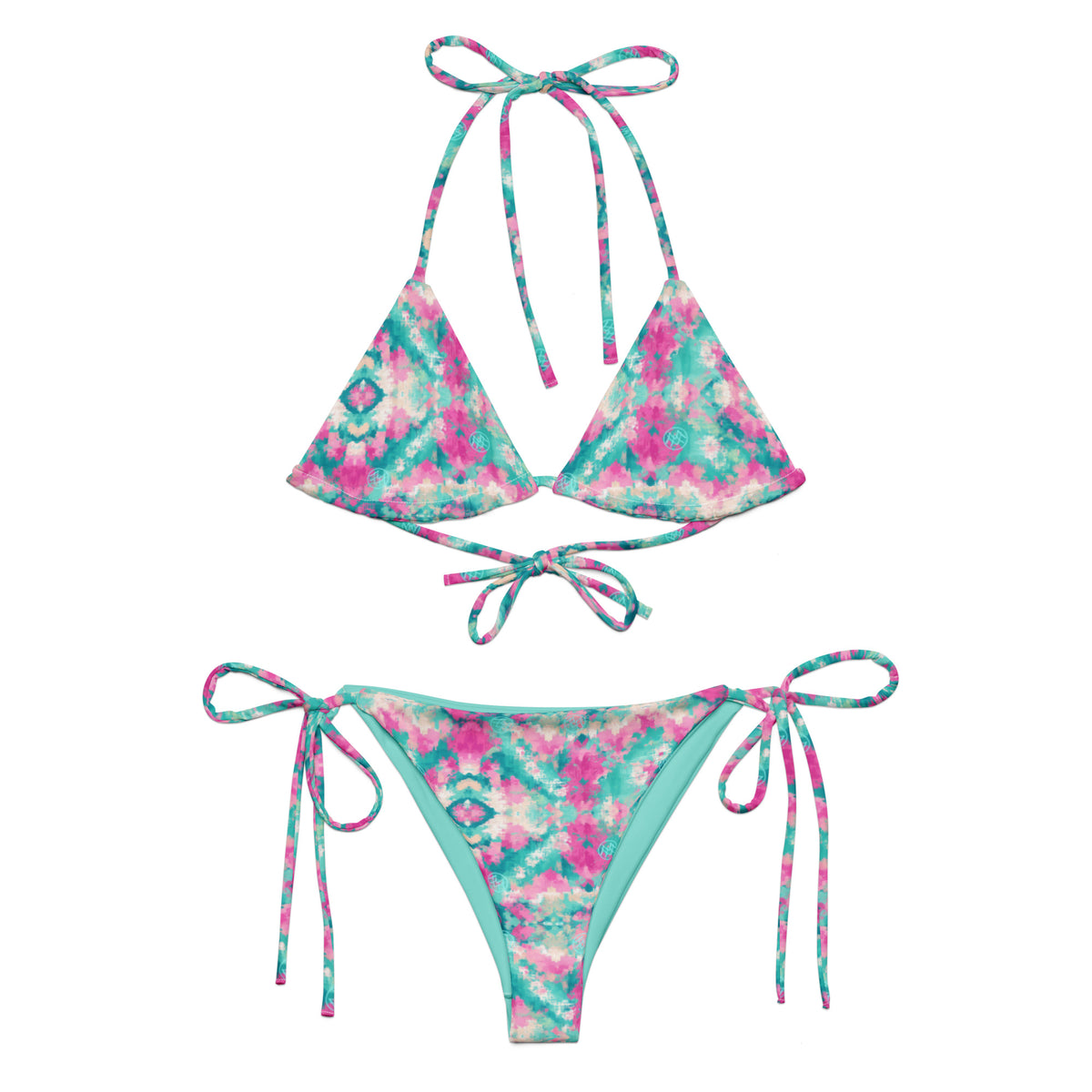 white string bikini with geometric turquoise and magenta pattern showing the front