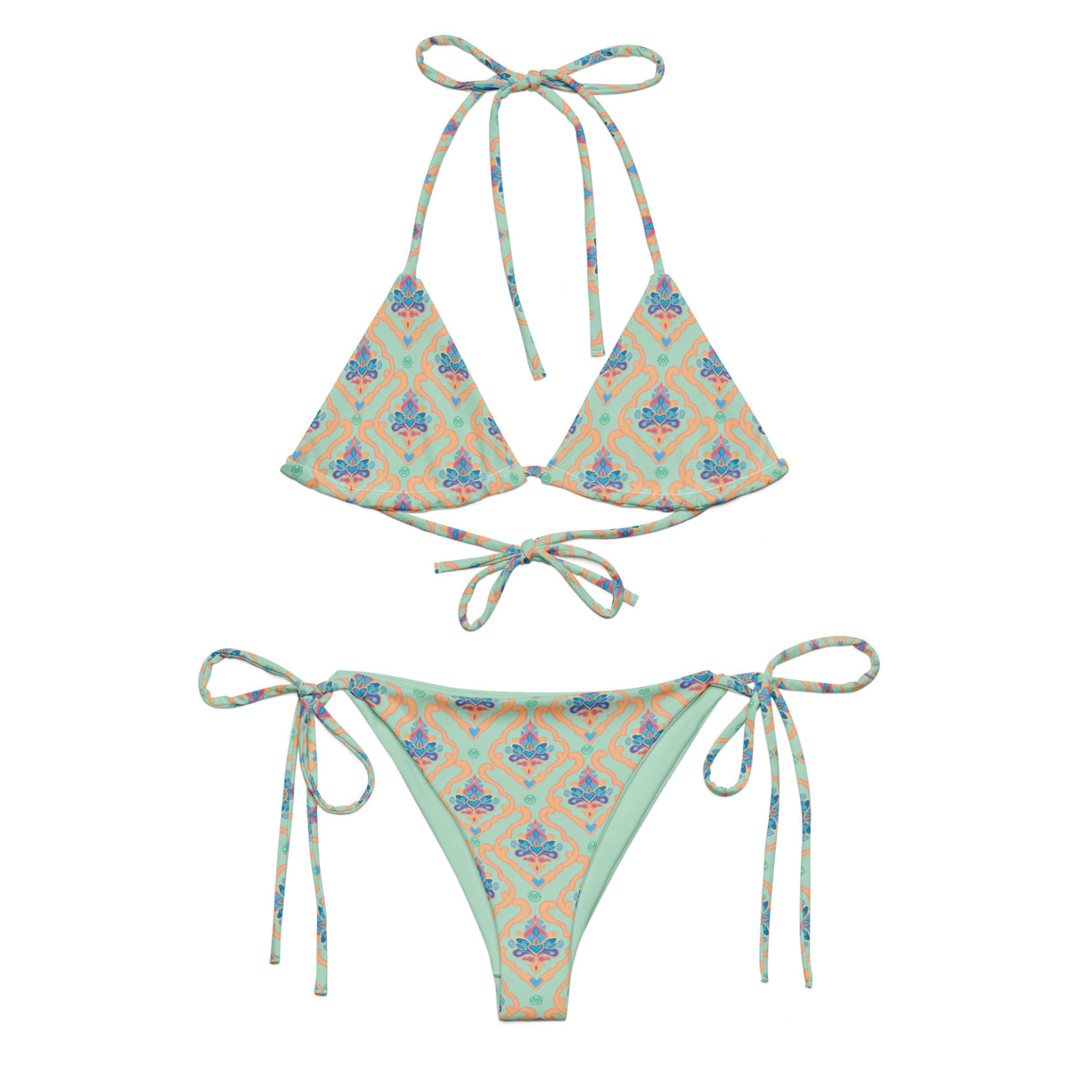 mint green string bikini with coral indian mughal lattice work design with blue and magenta accents showing the front