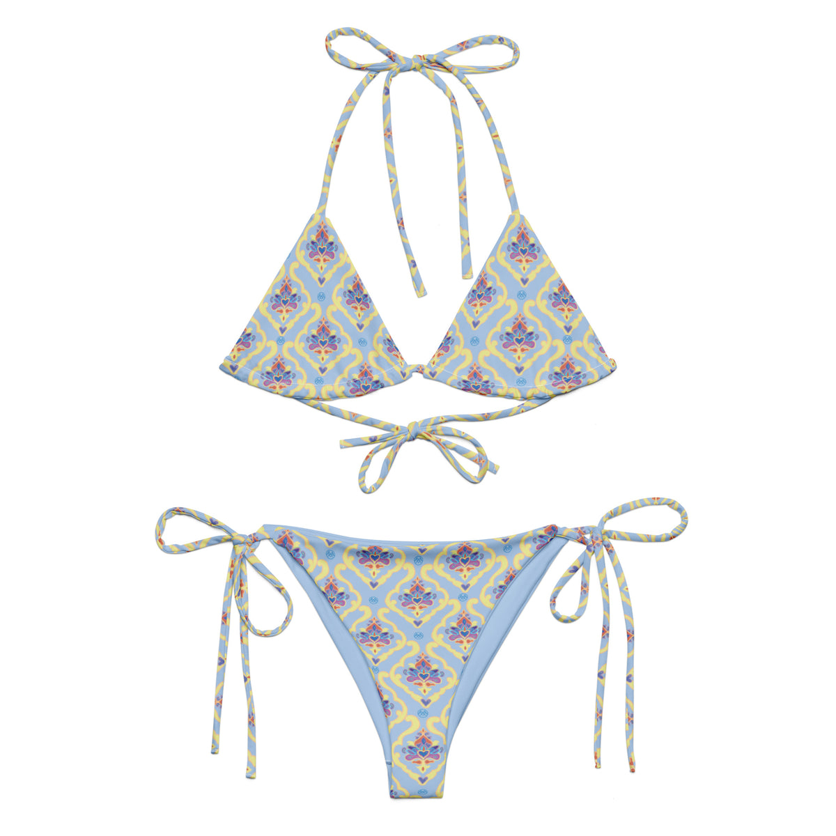 powder blue string bikini with ornate mughal india pattern in butter yellow pink and dark blue showing the front