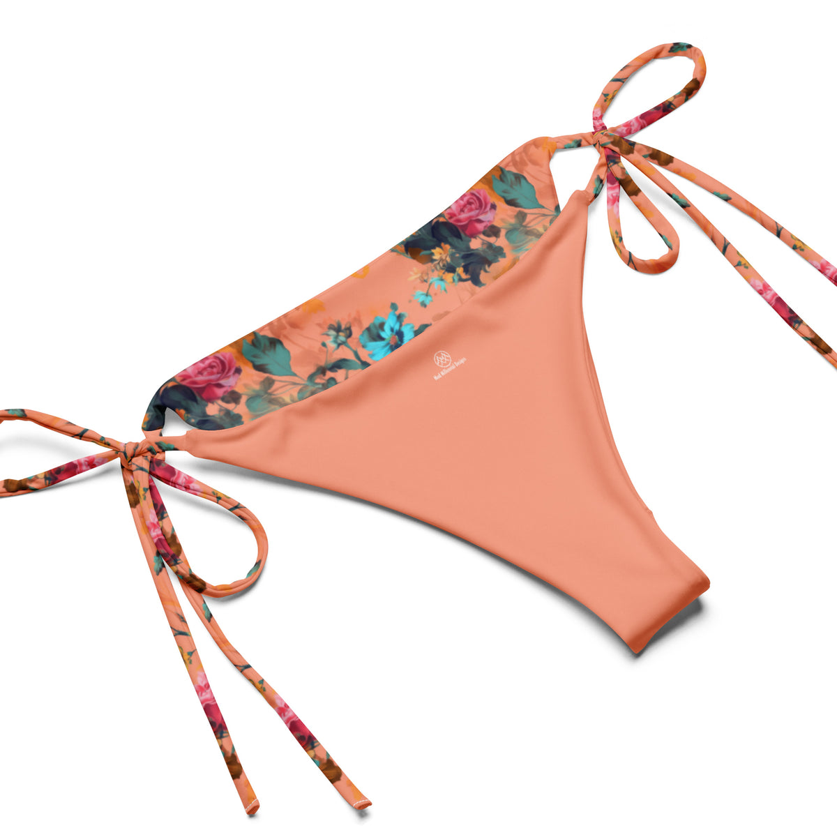 orange string bikini with hot pink turquoise and yellow feminine floral botanical pattern showing the inner lining and adjustable ties