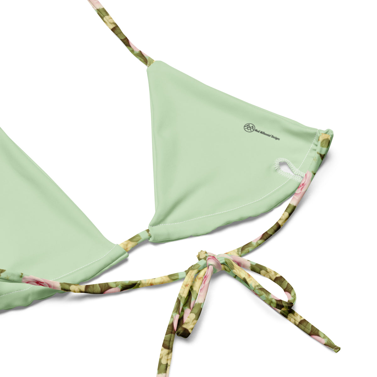 mint green string bikini with pink roses and green foliage feminine botanical floral pattern showing the inner lining and the adjustable ties
