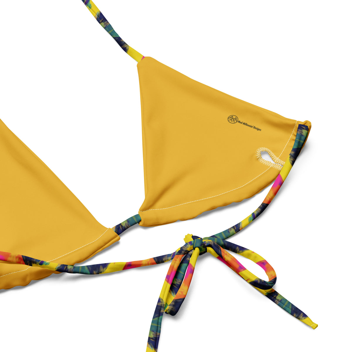 yellow string bikini with a colorful rainbow diamond geometric blue pink feminine western texas pattern showing the inner lining and the adjustable ties