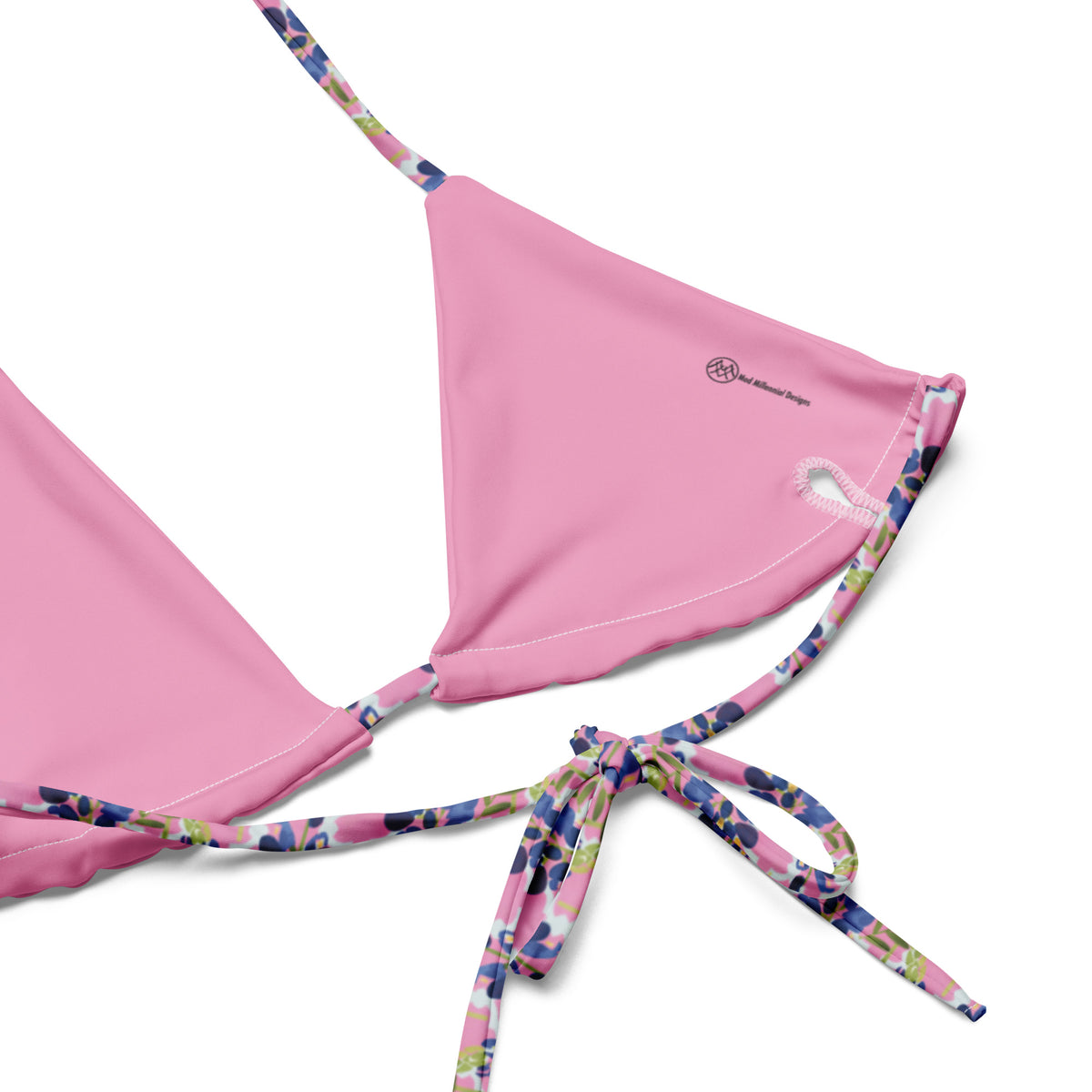 pink string bikini with quatrefoil and texas bluebonnet pattern showing the inner lining and the adjustable ties