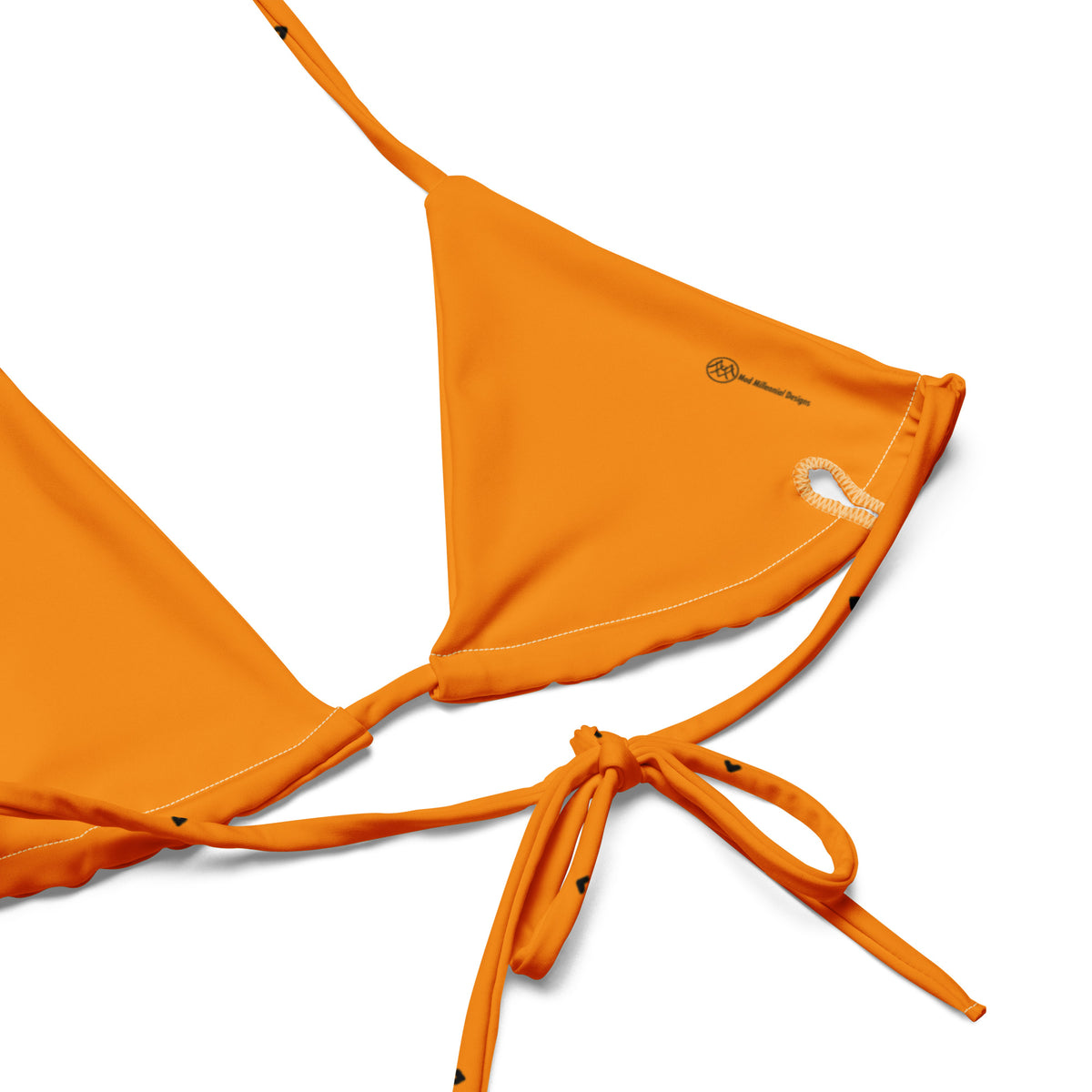 Trixie bright tangerine orange string bikini with tiny black heart print inner lining details
