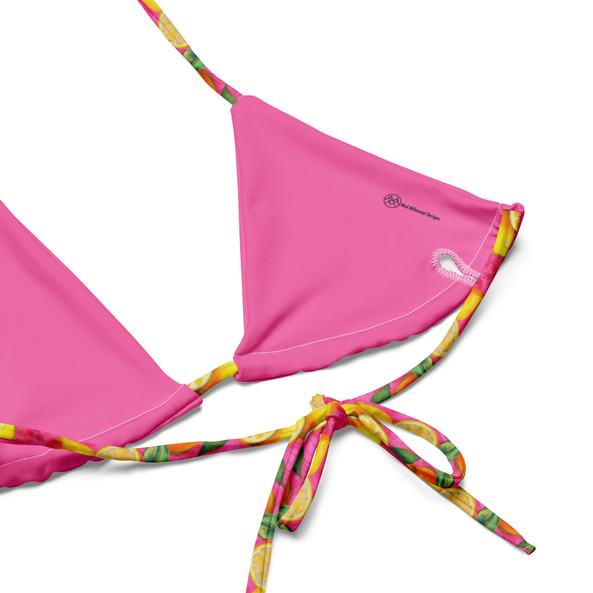 pink bikini with yellow lemon print on it close-up showing the lining and the adjustable ties