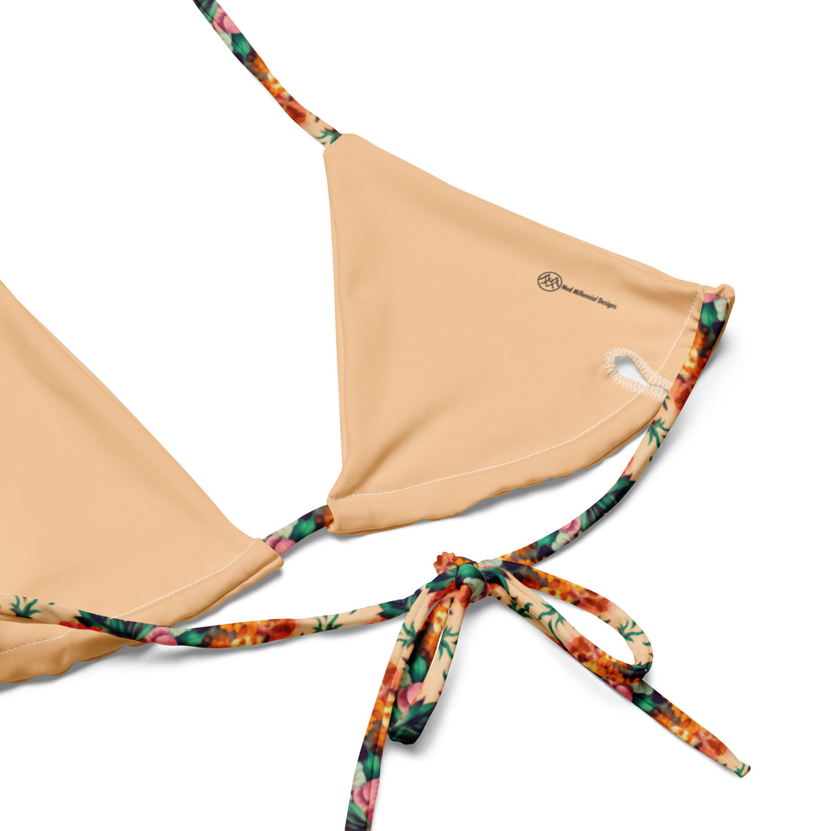 beige string bikini with coral and pink floral feminine botanical pattern showing the inner lining and the adjustable ties