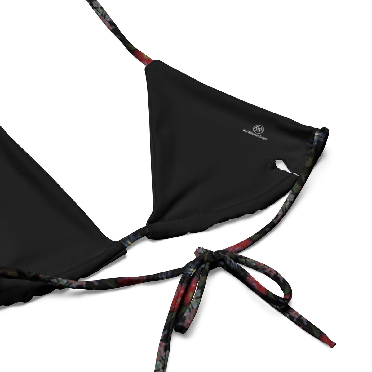 black string bikini with detailed floral colorful pattern close-up showing inner lining and adjustable ties