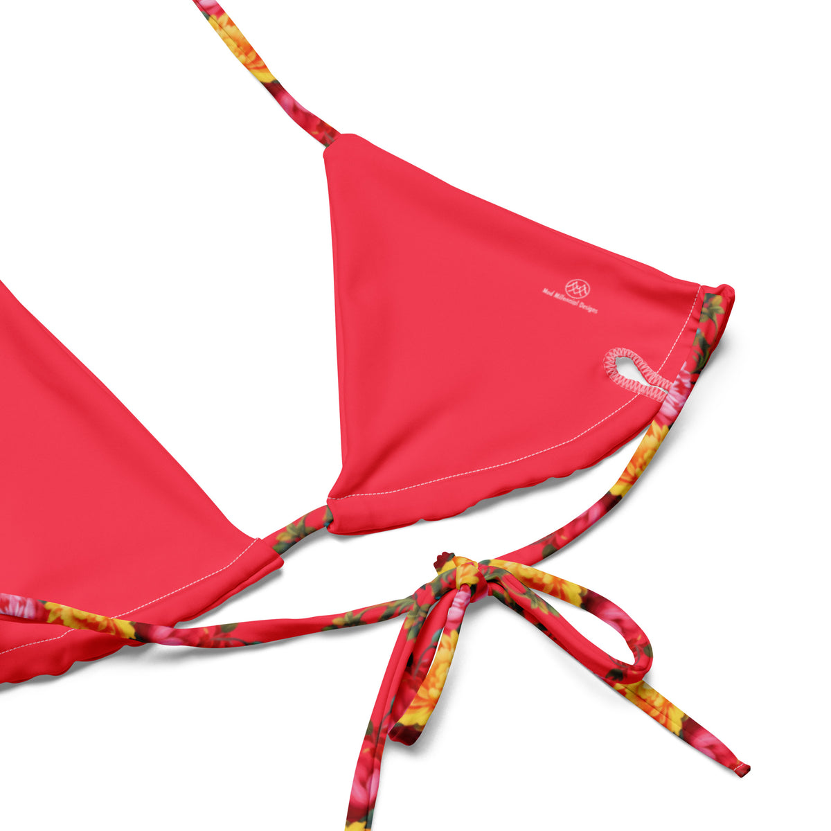 Close-up of red string bikini top with floral print lining