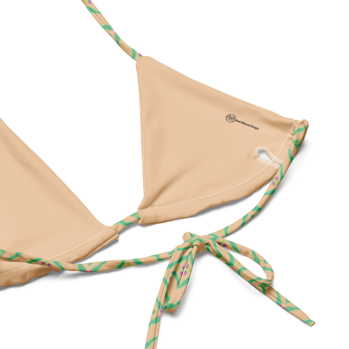 string bikini with an ornate peach mint pink india mughal pattern showing the inner lining and the adjustable ties