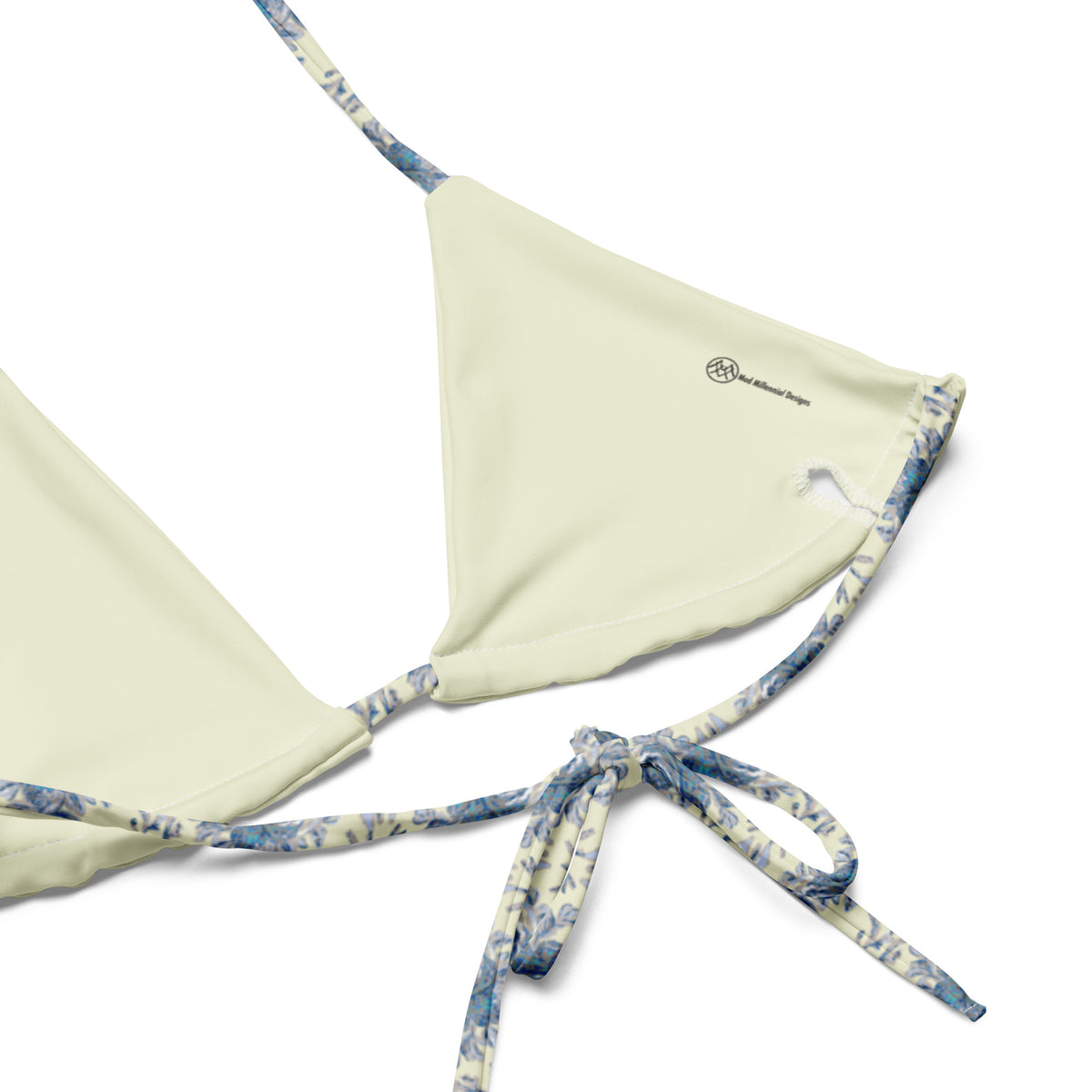Tasteful Teacup string bikini with buttercream ivory and powder blue rose botanical floral pattern showing the inner lining and the adjustable ties