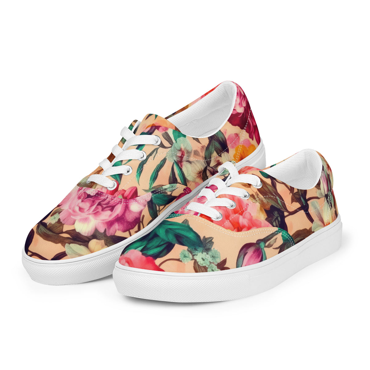 coral low-top sneakers with white laces with coral color and teal and pink floral botanical feminine pattern showing the shoes from the front at an angle