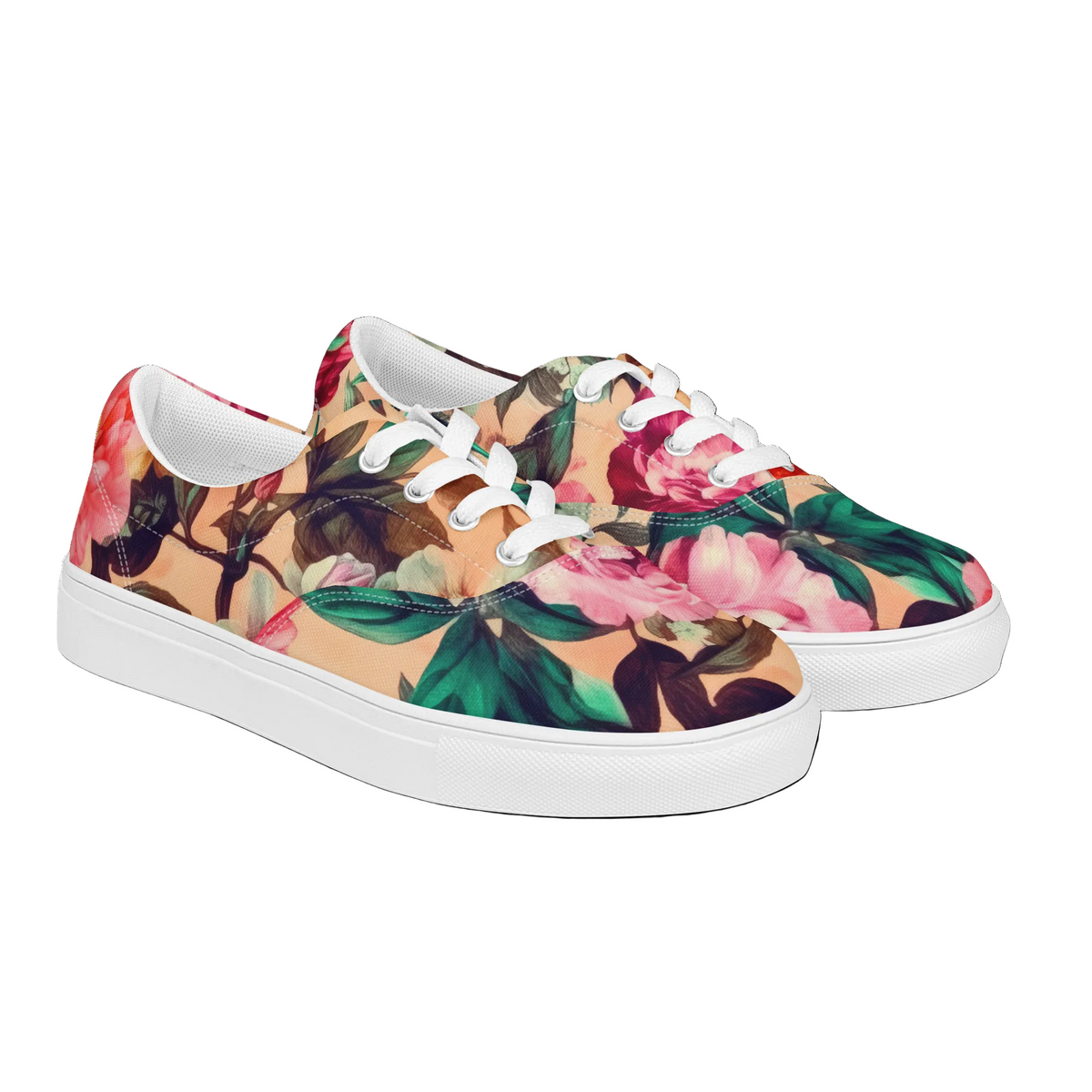 coral low-top sneakers with white laces with coral color and teal and pink floral botanical feminine pattern showing the shoes from the front at an angle