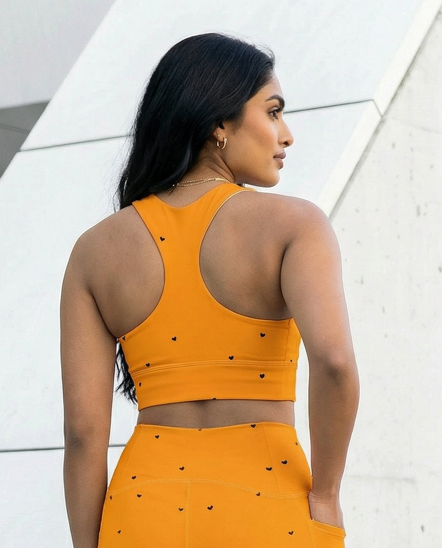 Sports Bra: Black Hearts Collection in Trixie