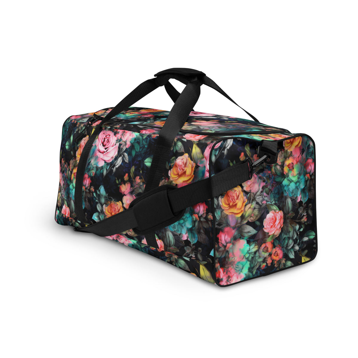 Full size black duffle bag with black handles and removable black shoulder strap and zipper enclosure with vivid rose feminine botanical floral pink yellow and teal pattern showing the front at an angle